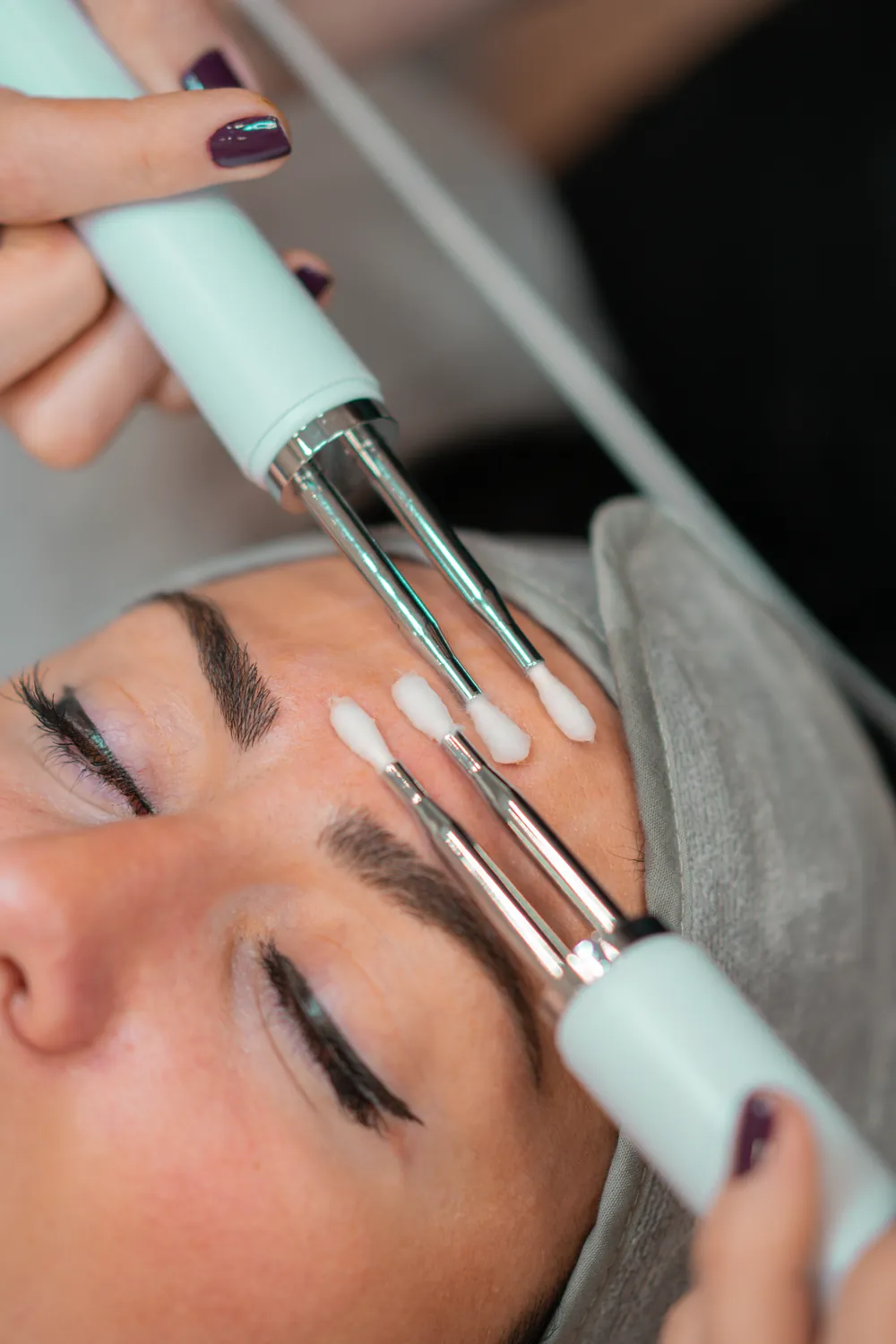 Close-up of a Microcurrent Facial New York treatment in progress at SI Glam Glow